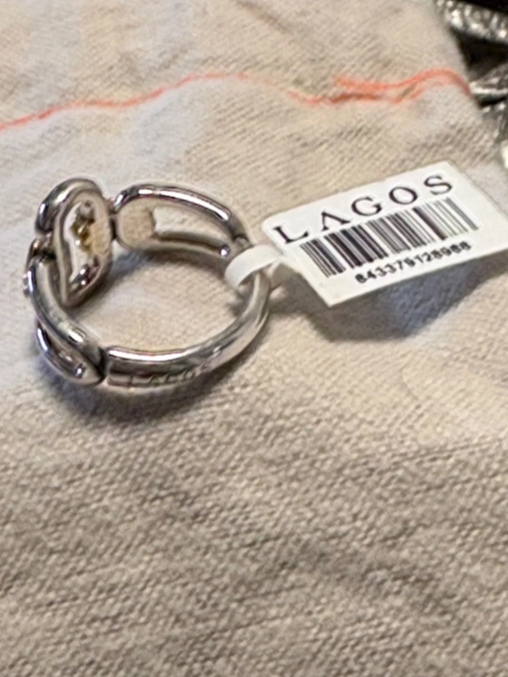 Lagos, Sterling, silver and 18k signature caviar 13 mm oval link ring. - Picture 2 of 3